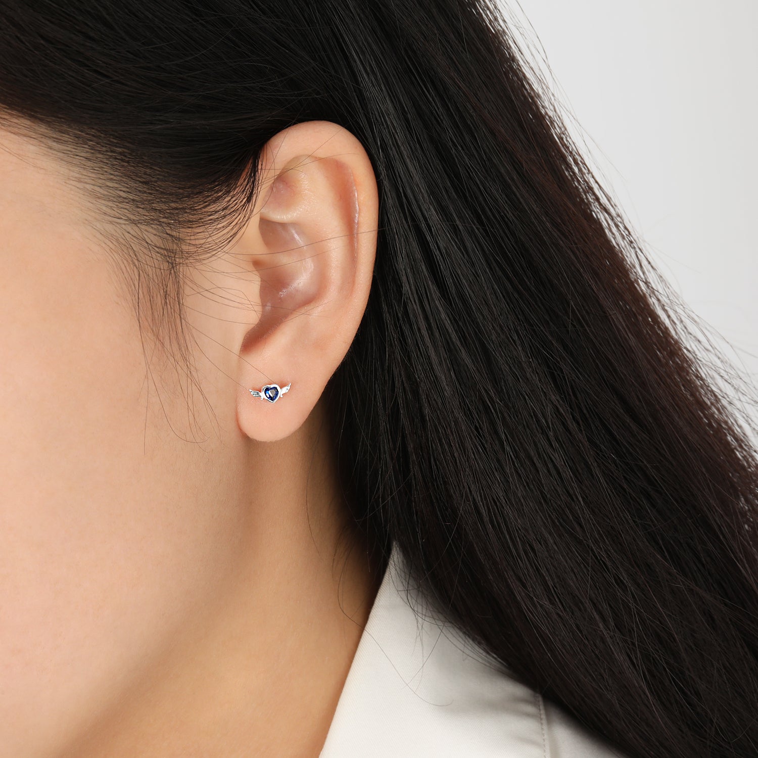 Blue CZ Flying Heart Stud Earrings - 925 Silver & 18K Gold